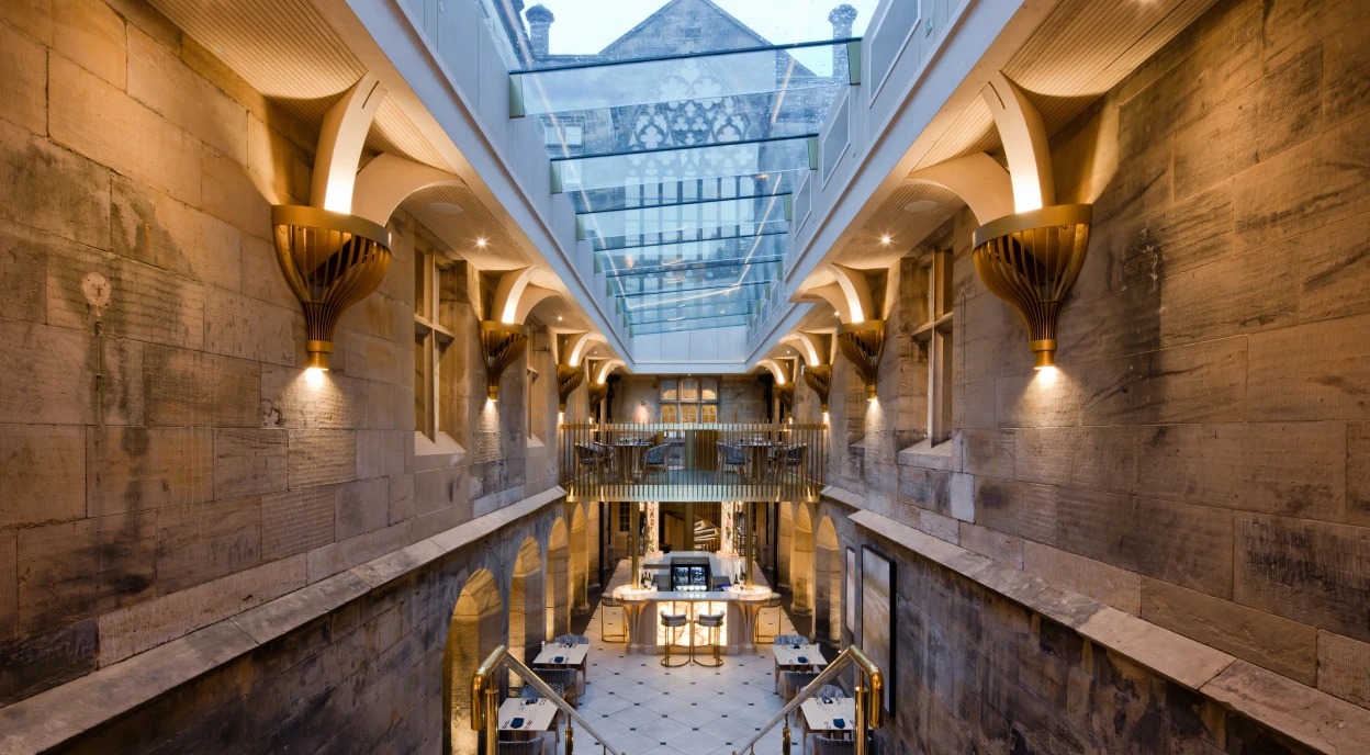 glass multi part skylight in modern hotel hallway
