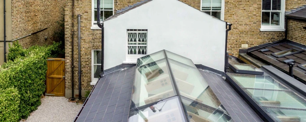 Shows the external of the roof with skylights on it