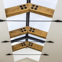 Shows a Ridgeglaze skylight shining down into kitchen